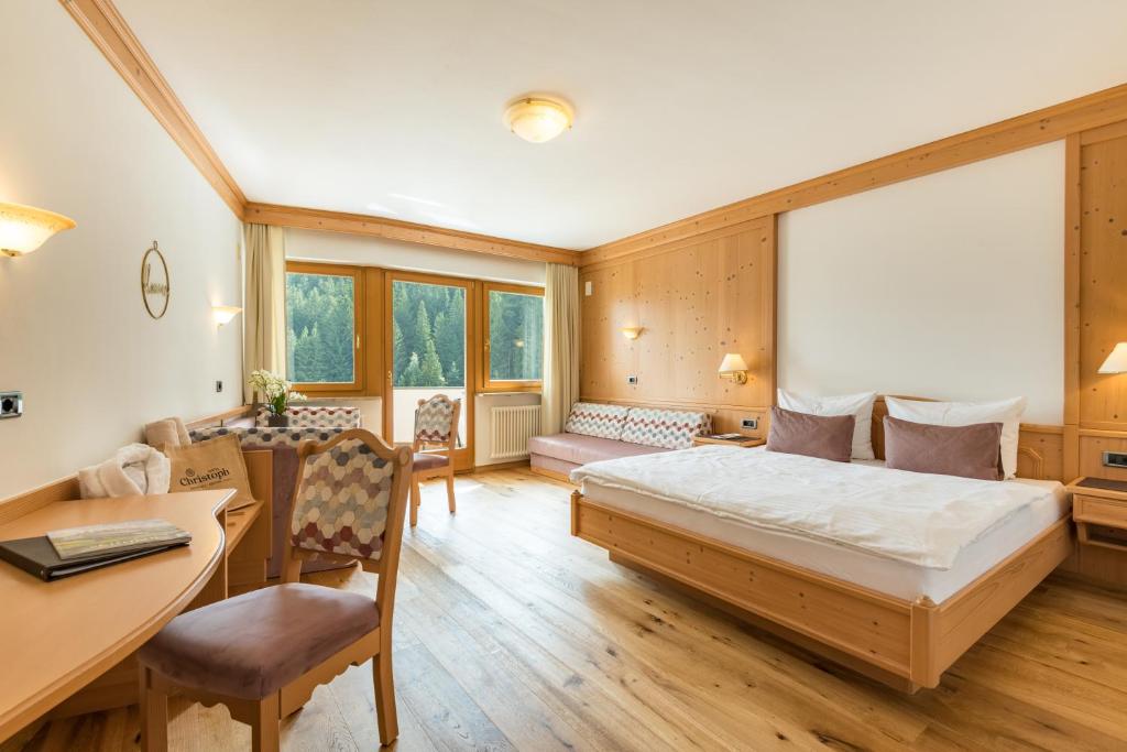 Postel nebo postele na pokoji v ubytování Hotel Christoph