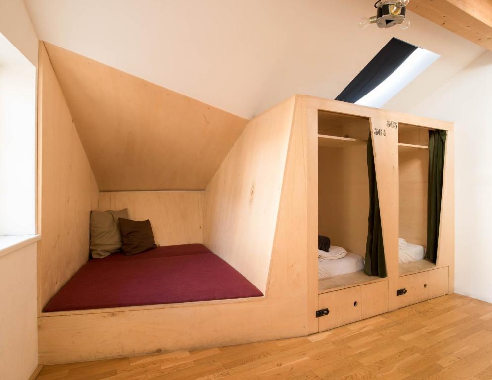 Postel nebo postele na pokoji v ubytování Montagu Hostel