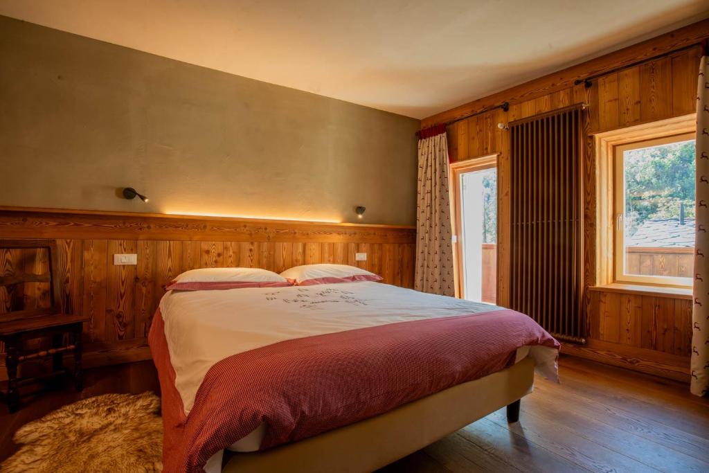 Postel nebo postele na pokoji v ubytování La Noix - Alloggi ad uso turistico - VDA - ARVIER - n 0041 e n 0042