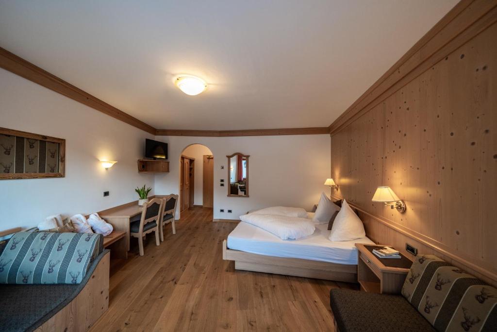 Postel nebo postele na pokoji v ubytování Hotel Christoph