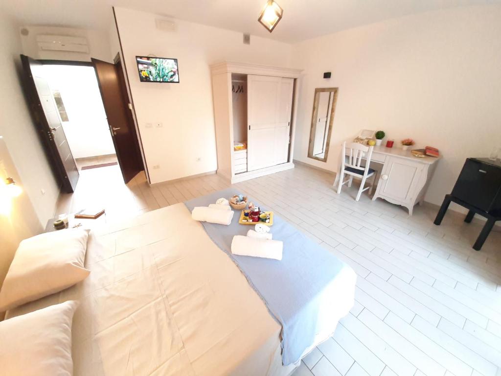 Postel nebo postele na pokoji v ubytování Dimore centro Lecce Affittacamere B&B