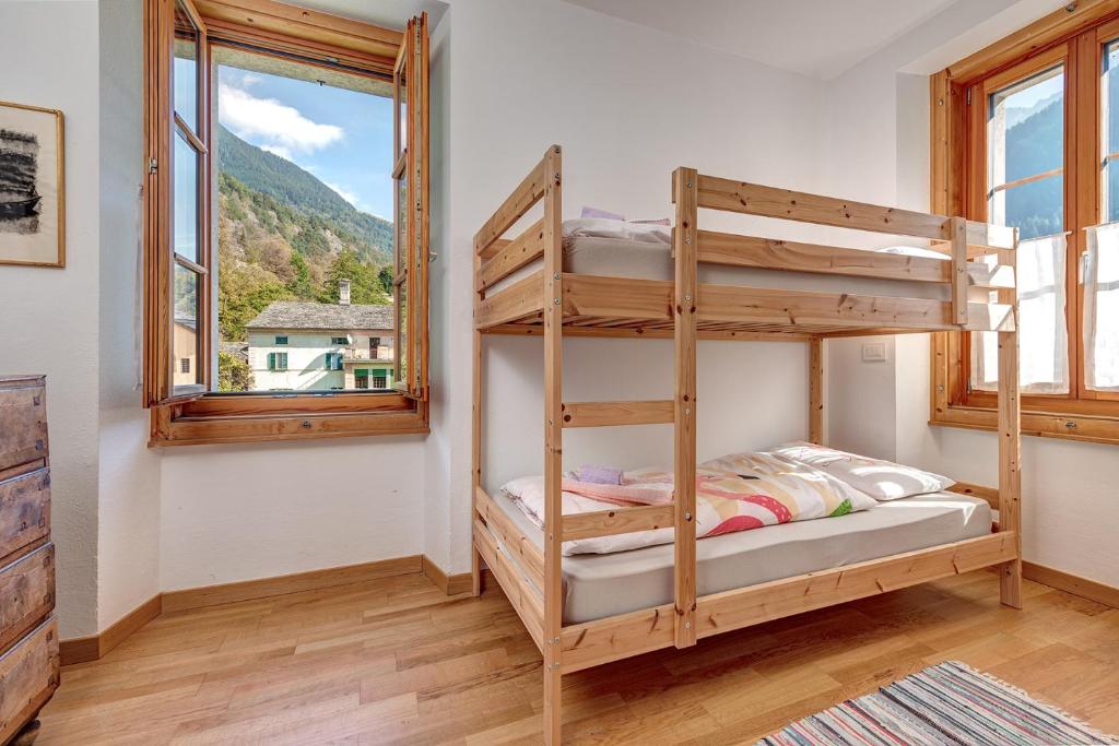 Letto o letti in una camera di Casa Pool tra St Moritz e il lago di Como