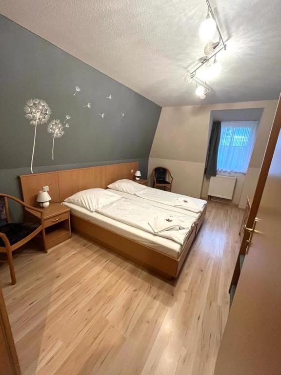Postel nebo postele na pokoji v ubytování Hotel Alte Apotheke