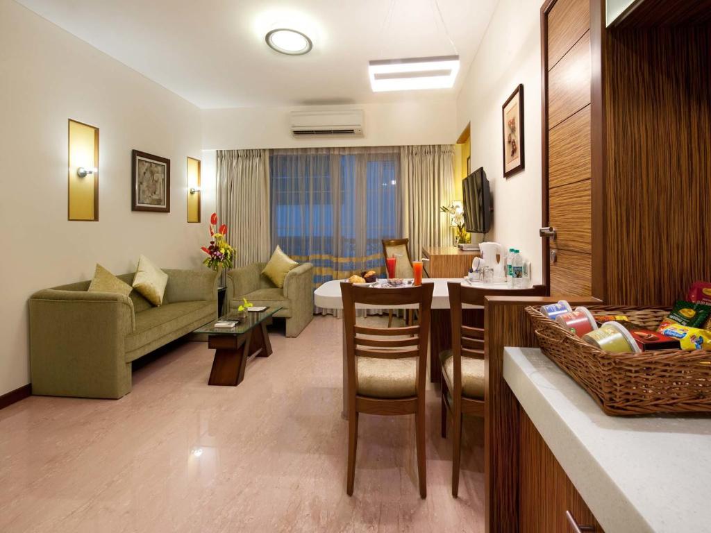 Posezení v ubytování Grand Residency Hotel & Serviced Apartments