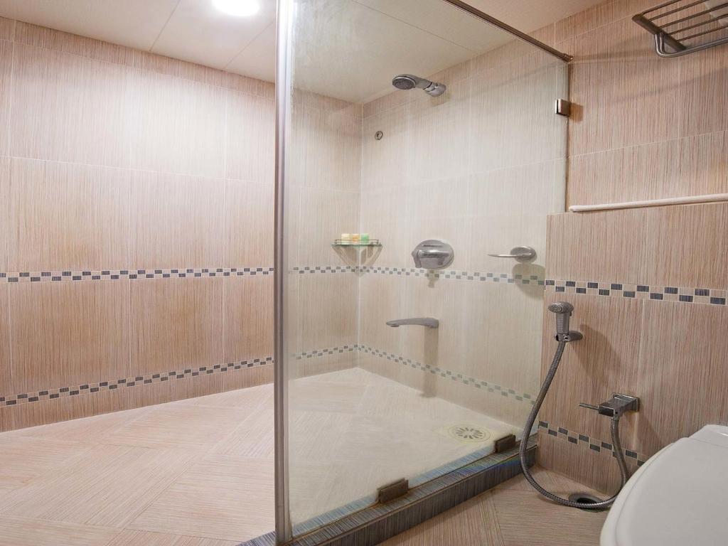 Koupelna v ubytování Grand Residency Hotel & Serviced Apartments