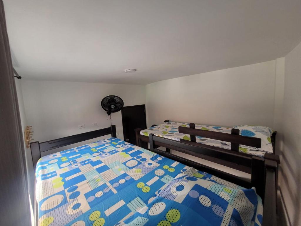 En eller flere senge i et værelse på Apartamento 920 San Gil
