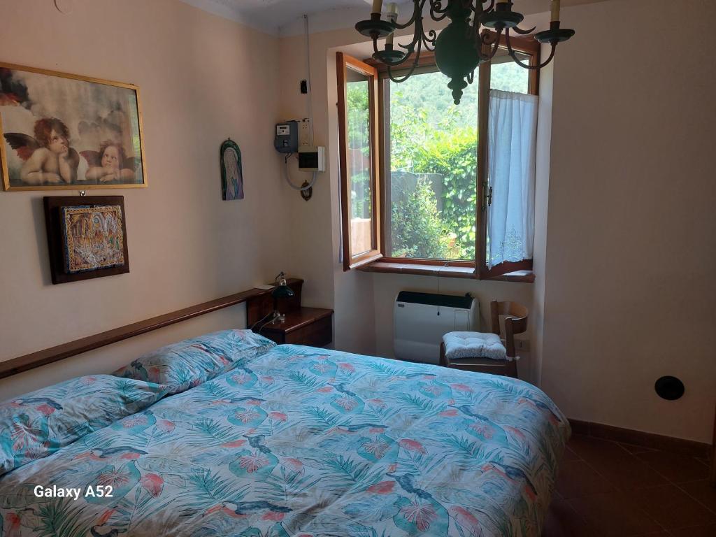 Ένα ή περισσότερα κρεβάτια σε δωμάτιο στο Al lago nel verde