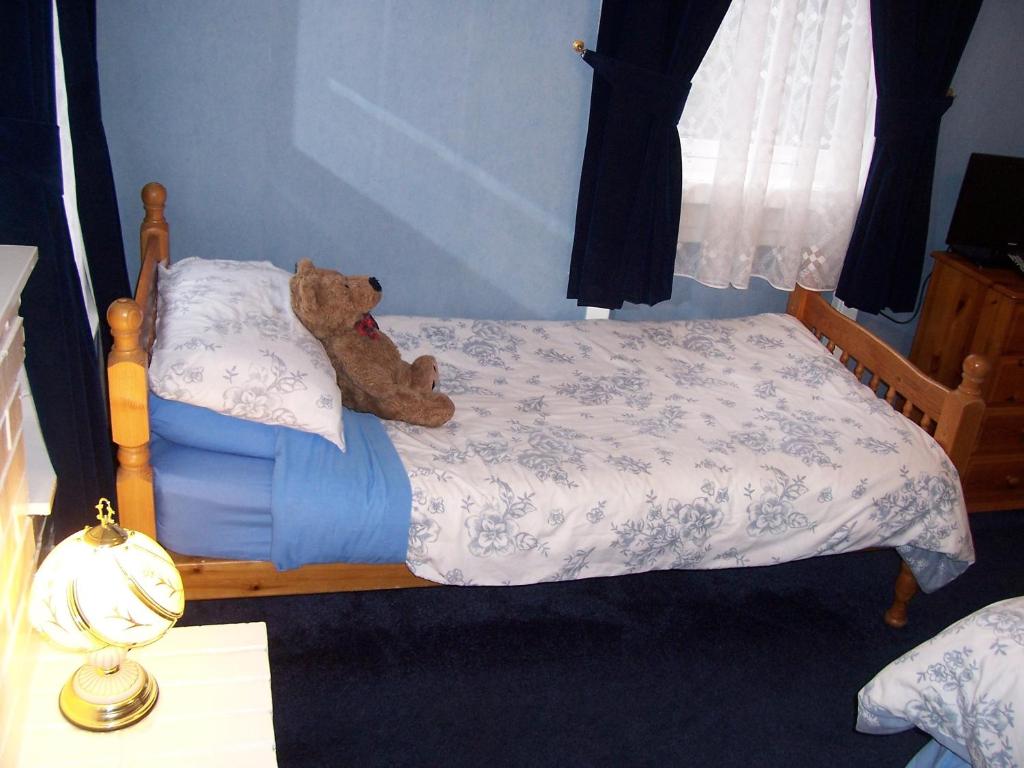 Postel nebo postele na pokoji v ubytování Sunnyside B&B