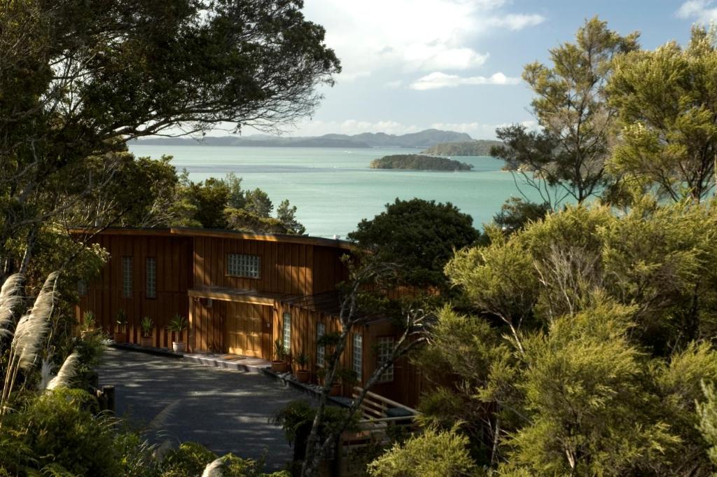 a house with a view of the water at The Sanctuary at Bay of Islands in Opua