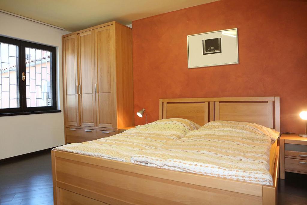 Łóżko lub łóżka w pokoju w obiekcie Apartments Ana City