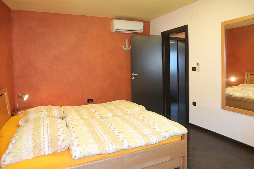 Łóżko lub łóżka w pokoju w obiekcie Apartments Ana City