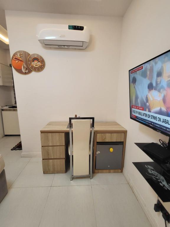 TV o dispositivi per l'intrattenimento presso Ikoyi/Banana Studio Room