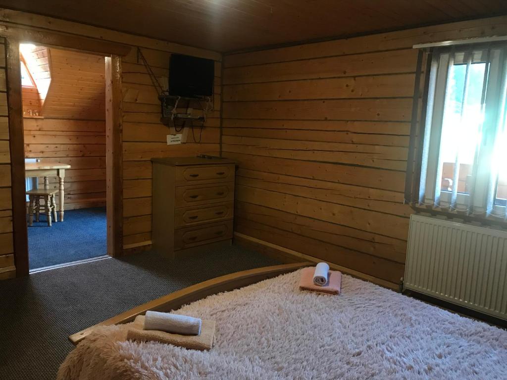 Postel nebo postele na pokoji v ubytování Trembita готель