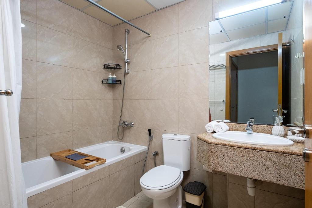 Fotografie z fotogalerie ubytování Delightful stay at the 1BR apt with coastal view v Dubaji
