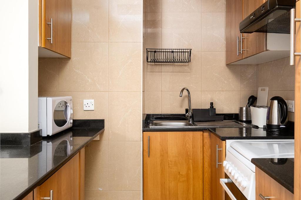Fotografie z fotogalerie ubytování Delightful stay at the 1BR apt with coastal view v Dubaji