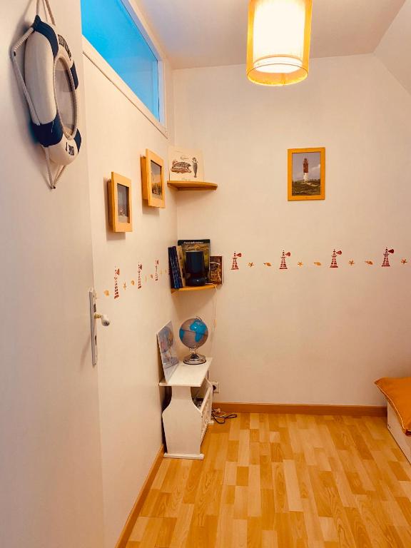 Kuchyň nebo kuchyňský kout v ubytování Le Gîte du Phare vue sur mer