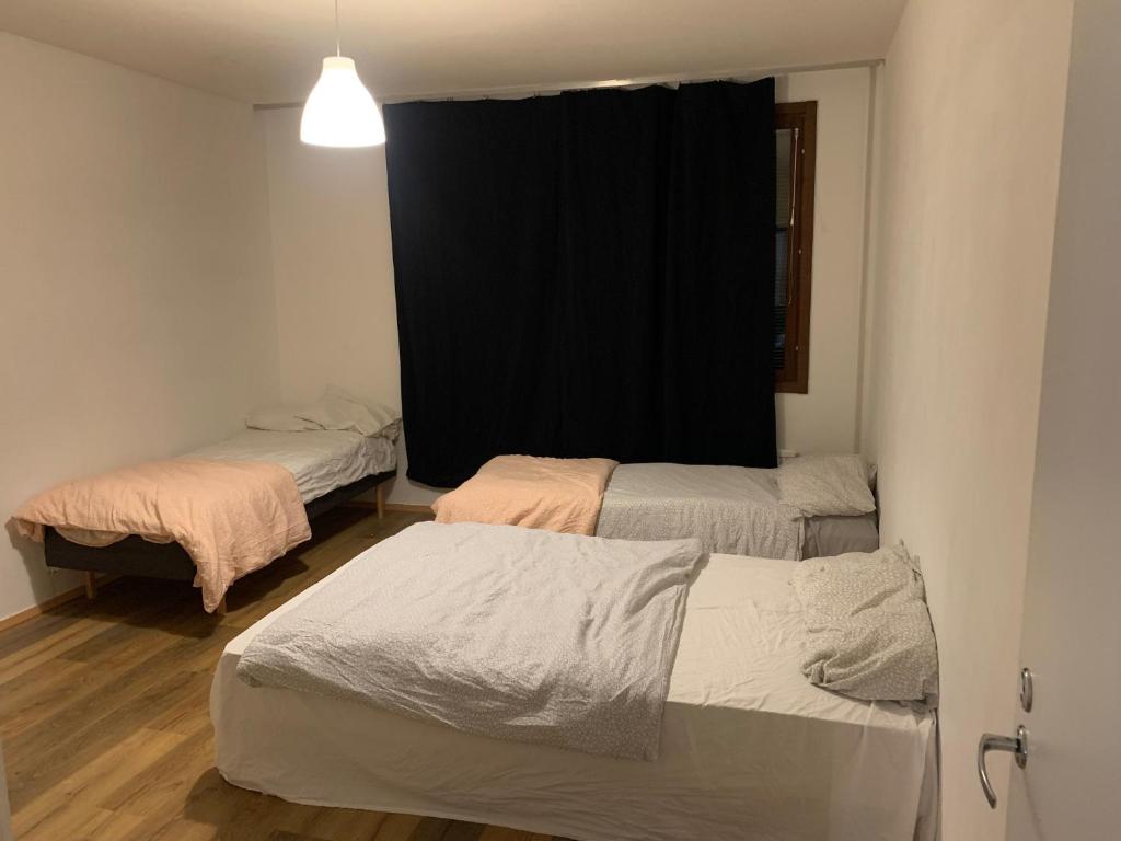 Postel nebo postele na pokoji v ubytování Star Family Apartments