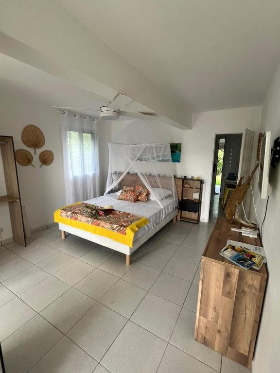 Postel nebo postele na pokoji v ubytování Villa Ti Lanmou