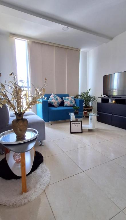 Posezení v ubytování CB Somos AT HOME Apto cómodo e impecable con Aire Acondicionado