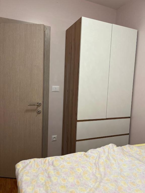 Postel nebo postele na pokoji v ubytování PANDORA AVENY CACAK