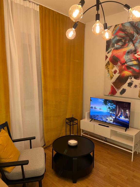 TV a/nebo společenská místnost v ubytování Noah Longstay Borås