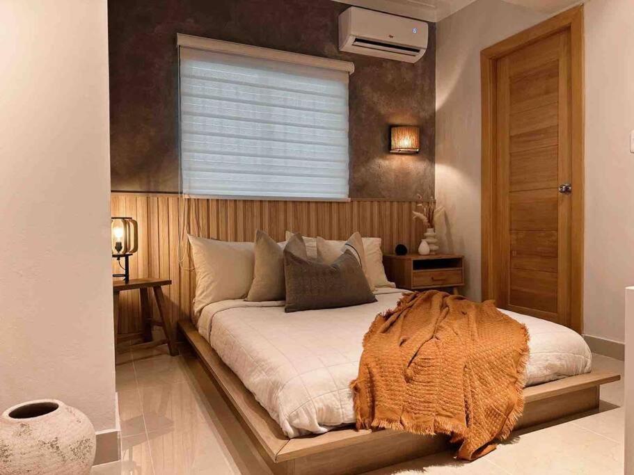 Postel nebo postele na pokoji v ubytování Cómodo y equipado apartamento en el Cacique
