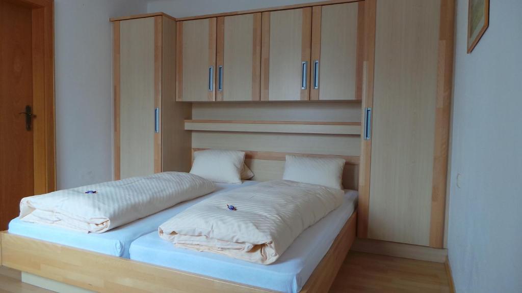 Postel nebo postele na pokoji v ubytování Hotel Hörlgut