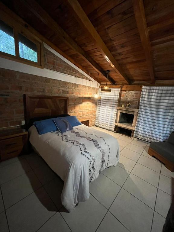 Postel nebo postele na pokoji v ubytování CABAÑA EN MAZAMITLA