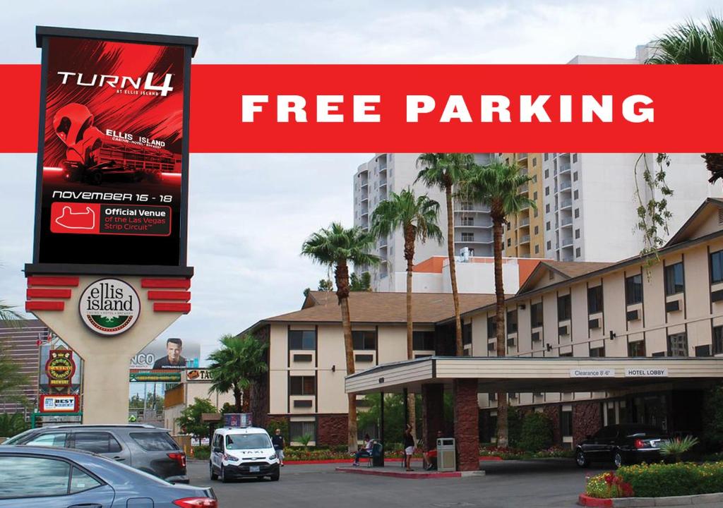 a sign that reads free parking in front of a building at Ellis Island Hotel Casino & Brewery in Las Vegas