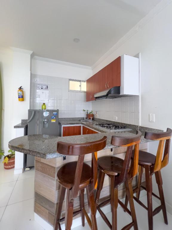 Kuchyň nebo kuchyňský kout v ubytování Apartamentos Playa Rodadero