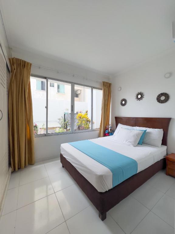 Postel nebo postele na pokoji v ubytování Apartamentos Playa Rodadero