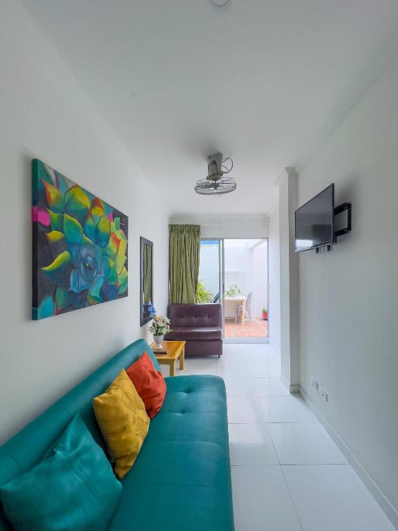 TV a/nebo společenská místnost v ubytování Apartamentos Playa Rodadero
