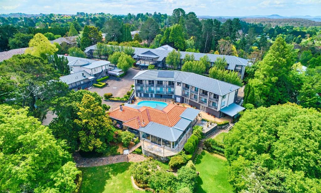 an aerial view of a large house with a pool at Leura Gardens Resort in Leura