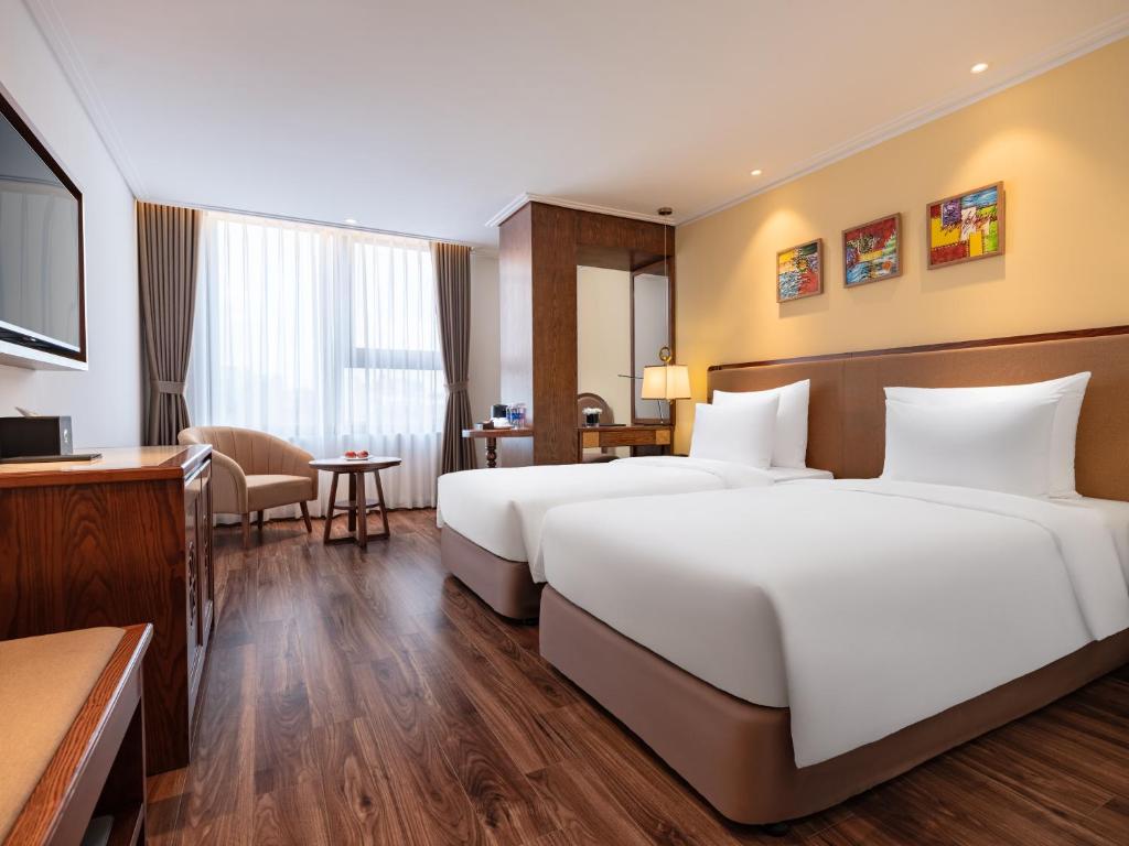 Postel nebo postele na pokoji v ubytování Nesta Hotel & Spa