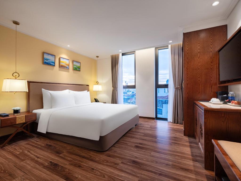Postel nebo postele na pokoji v ubytování Nesta Hotel & Spa