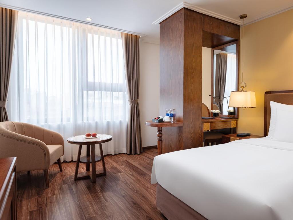 Postel nebo postele na pokoji v ubytování Nesta Hotel & Spa