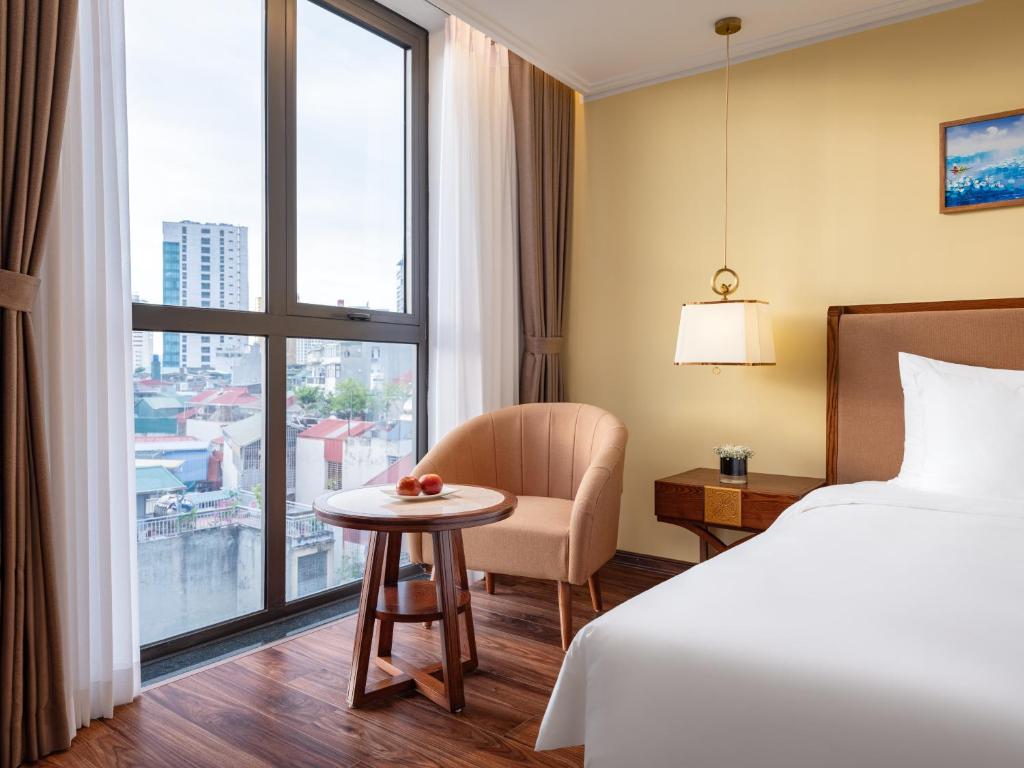 Postel nebo postele na pokoji v ubytování Nesta Hotel & Spa