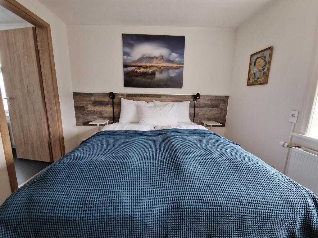 Postel nebo postele na pokoji v ubytování Guesthouse Mikael