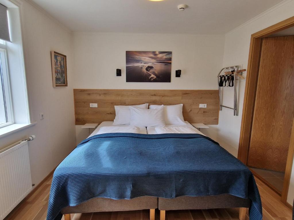Postel nebo postele na pokoji v ubytování Guesthouse Mikael