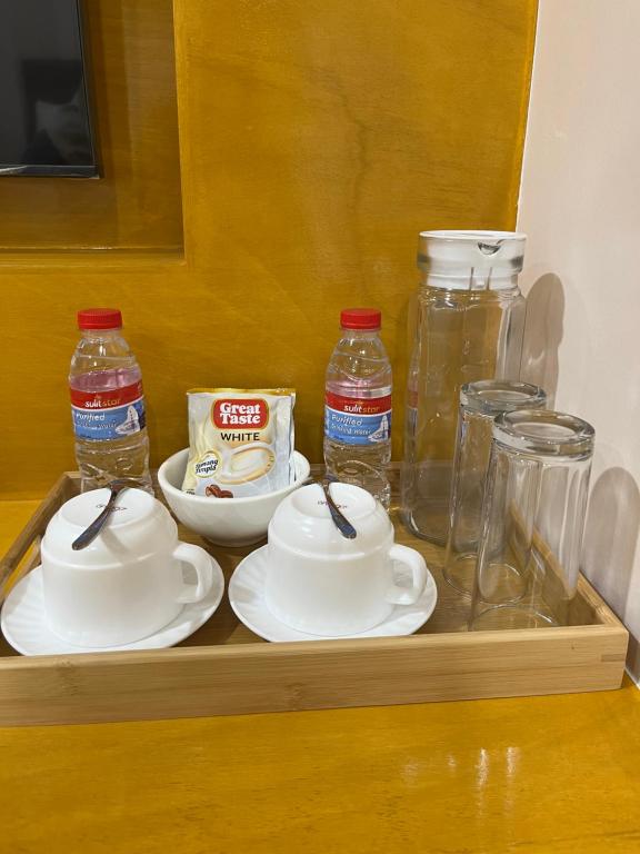 Příslušenství pro přípravu čaje a kávy v ubytování The Legacy Hotel