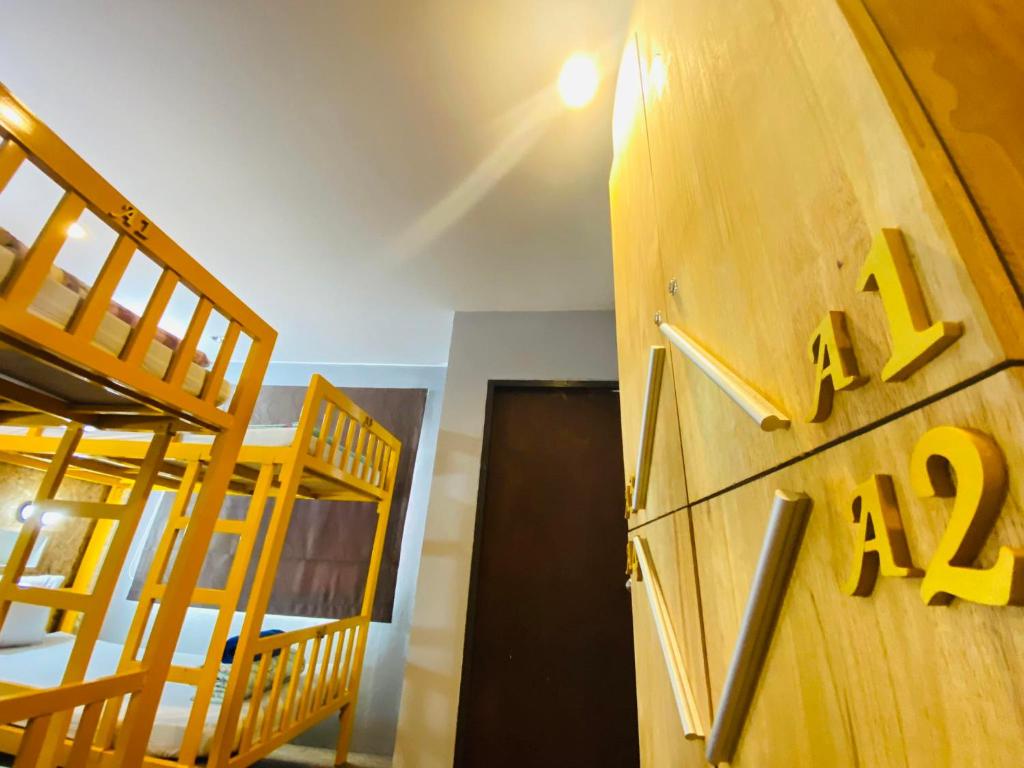 Postel nebo postele na pokoji v ubytování Frutta Hostel