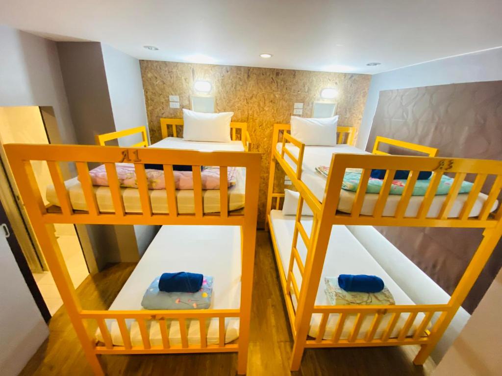 Postel nebo postele na pokoji v ubytování Frutta Hostel