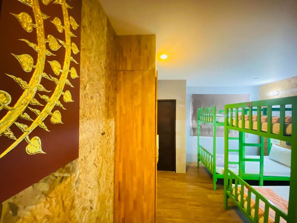 Postel nebo postele na pokoji v ubytování Frutta Hostel