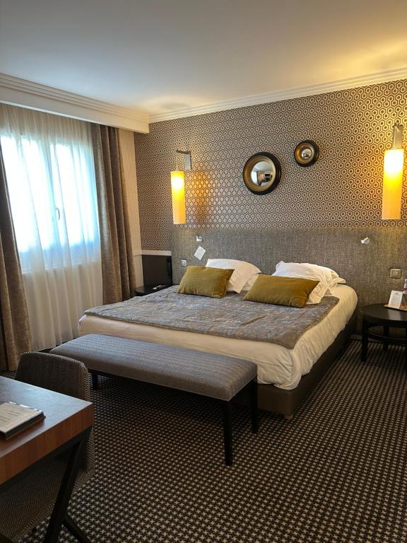 Postel nebo postele na pokoji v ubytování Maison Lia, ex Pasteur
