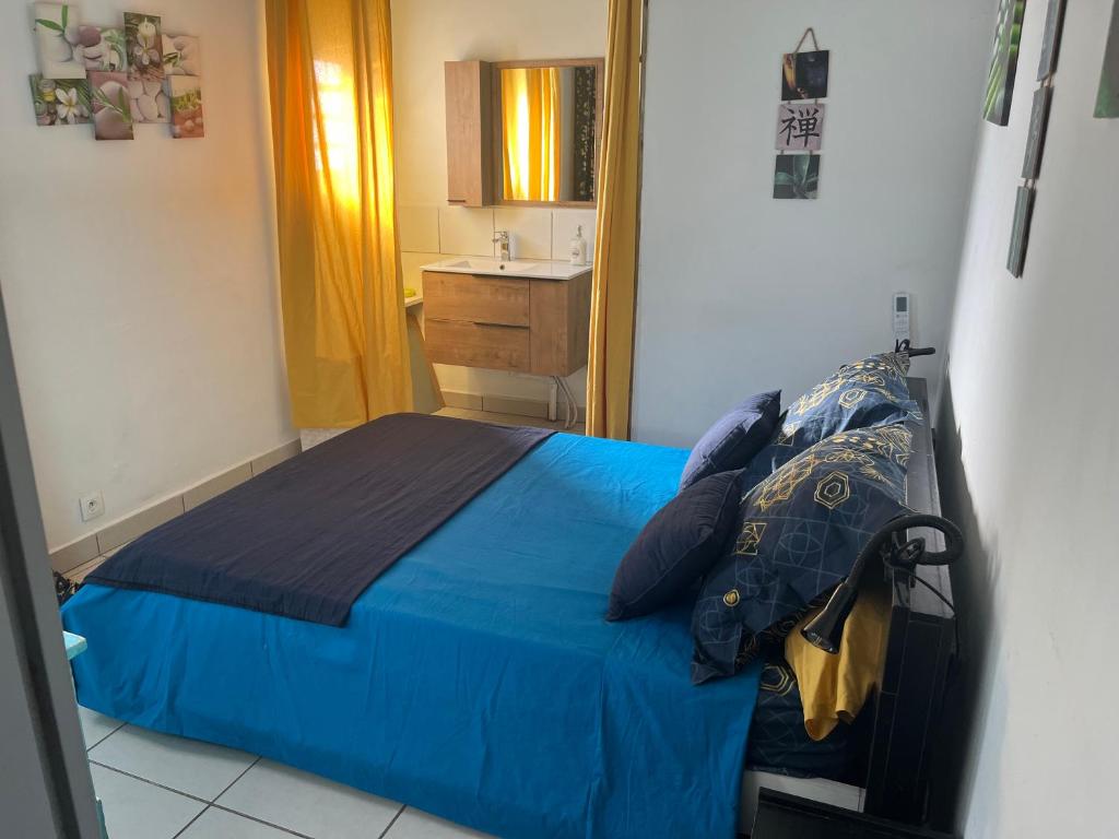 Postel nebo postele na pokoji v ubytování Le Cannelle