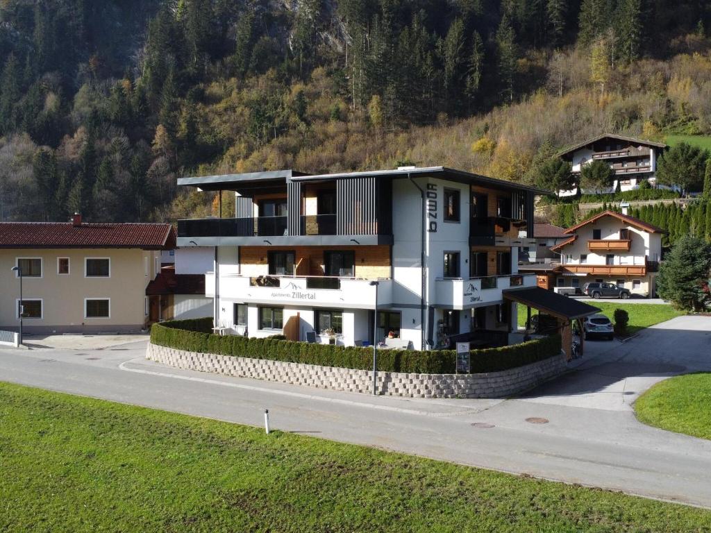 a house in the middle of a road at Spacious Apartment near Ski Area in Mayrhofen in Mayrhofen