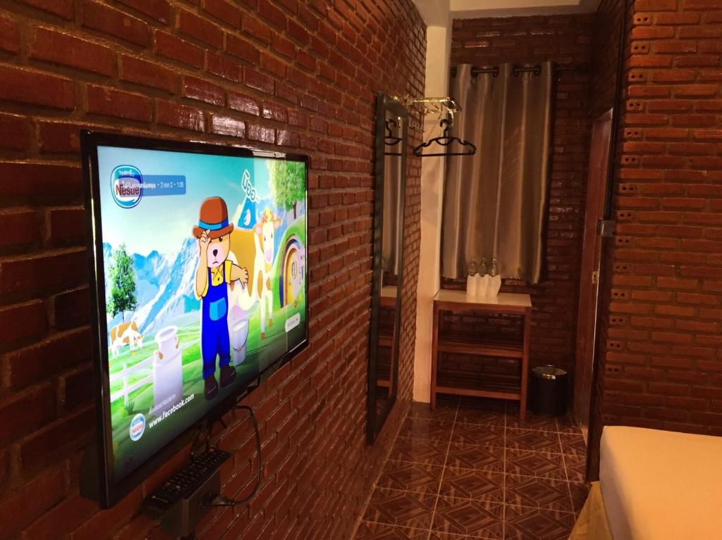 TV a/nebo společenská místnost v ubytování Ben Guesthouse