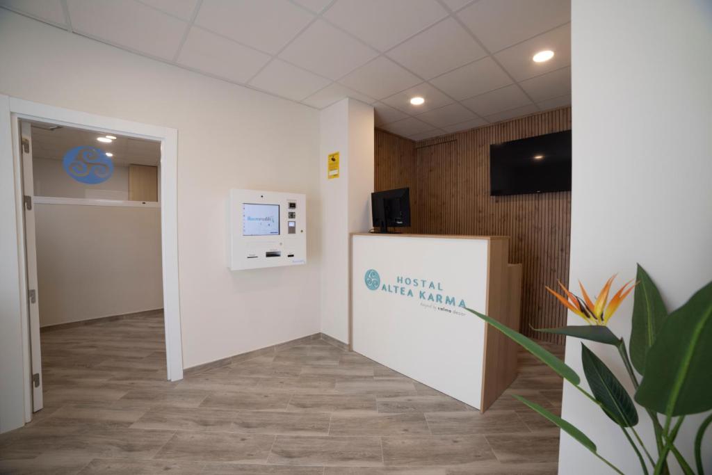 TV a/nebo společenská místnost v ubytování Hostal Altea Karma