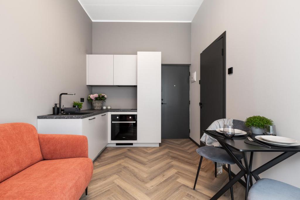 Kuchyň nebo kuchyňský kout v ubytování Rare Apartments - Self Check-In Miniapartments