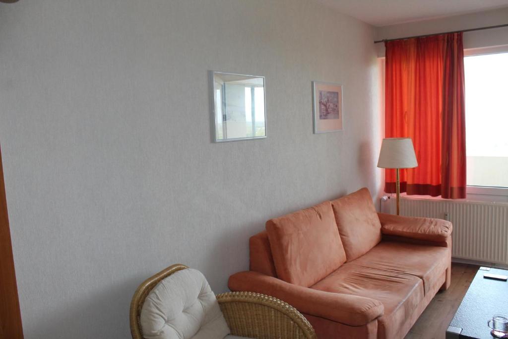Posezení v ubytování Ostseeferienwohnung K1317 mit Meerblick
